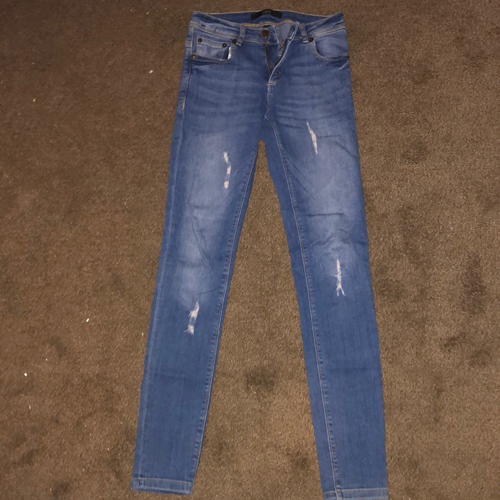 Light ripped skinny jeans
